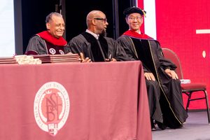 The Founding President and the Executive Vice President at the diploma table, the Class of 2025.